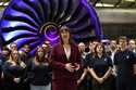 Britain's Chancellor of the Exchequer Rachel Reeves, center, speaks with the media at the Rolls-Roy…