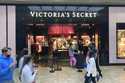 Shoppers pass a Victoria's Secret store at a shopping mall in Scranton, Pa