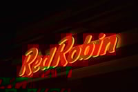 Columbus, Ohio-USA June 30,2019: Red Robin American cuisine restaurant with night sign illumination. - Stock Editorial Photography